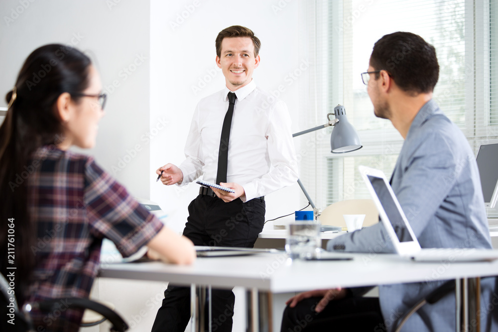 Business people working together in the office Business people working together in the office