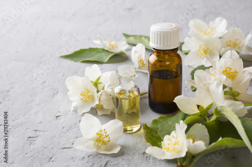 Oil of jasmine. Aromatherapy with jasmine oil. Jasmine flowers