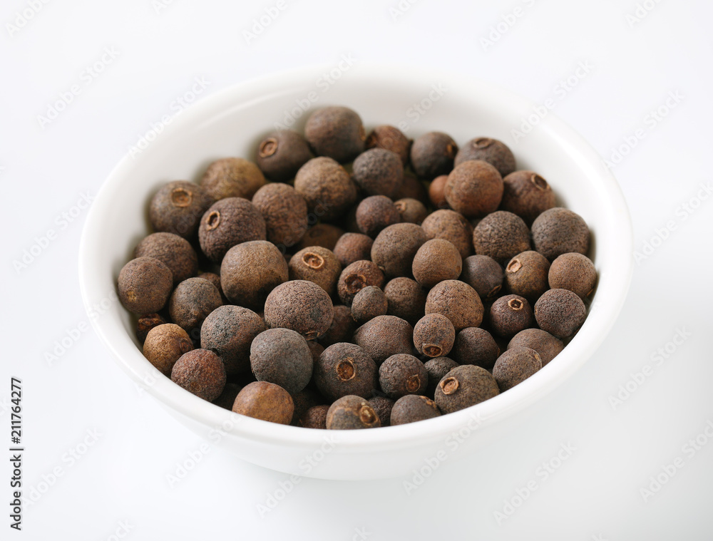 bowl of allspice berries bowl of allspice berries