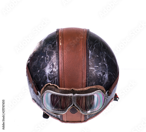 old motorcycle helmet on white isolated background