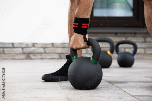 man with a kettlebell 