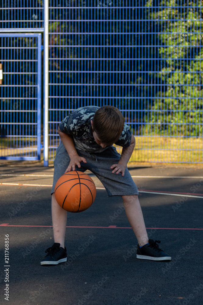 Pre-teen caucasian boy playing outside Pre-teen caucasian boy playing outside