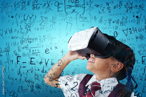 Composite image of close-up of schoolgirl using virtual reality