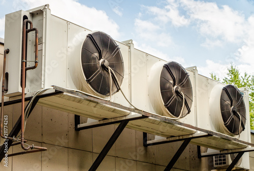 Compressor unit of industrial air conditioners, assembled on the wall.