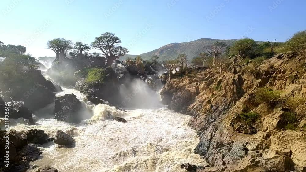 Sunrise in waterfall Epupa Falls, Northern Namibia Sunrise in waterfall Epupa Falls, Northern Namibia
