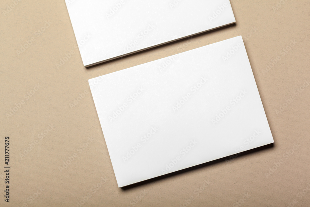 Blank paper pieces for mock up on a beige background Blank paper pieces for mock up on a beige background