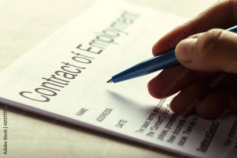 Close up shot of Eyeglasses on contract document papers business concept Close up shot of Eyeglasses on contract document papers business concept