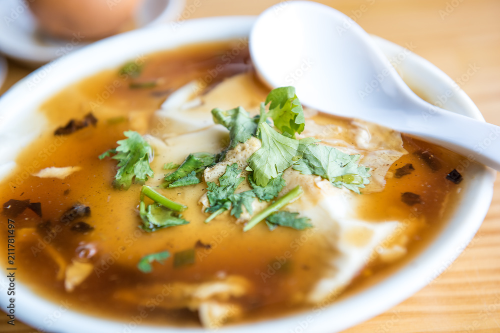 Jellied bean curd and cilantro leaves. Tofu pudding. Unique Traditional Chinese Foods Jellied bean curd and cilantro leaves. Tofu pudding. Unique Traditional Chinese Foods