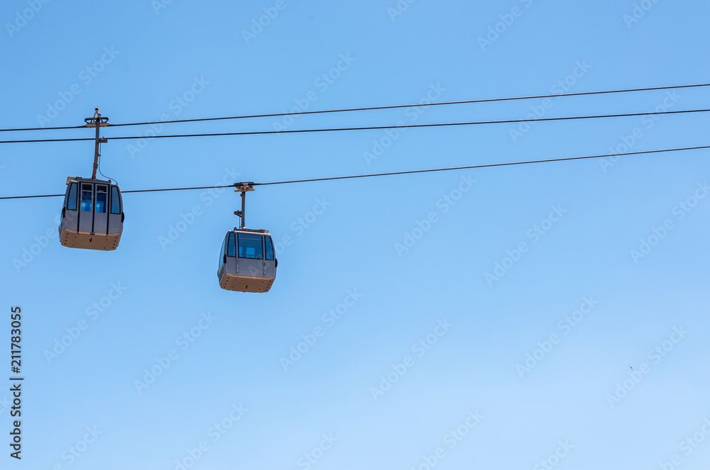 cableway against the sky, transport at height and tourist attraction cableway against the sky, transport at height and tourist attraction