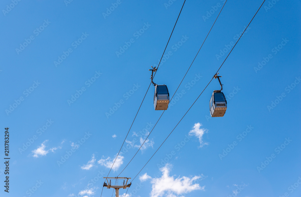 cableway against the sky, transport at height and tourist attraction cableway against the sky, transport at height and tourist attraction
