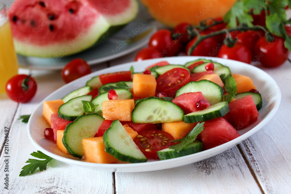 Fresh salad with fruits and vegetables. Top view with copy space.