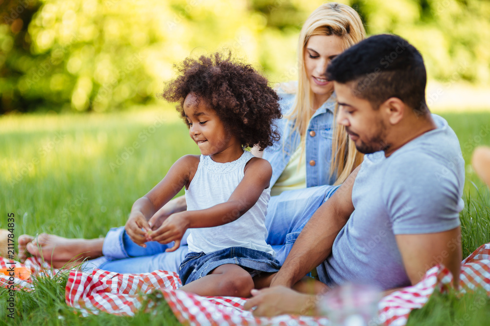Happy family having fun time on picnic Happy family having fun time on picnic