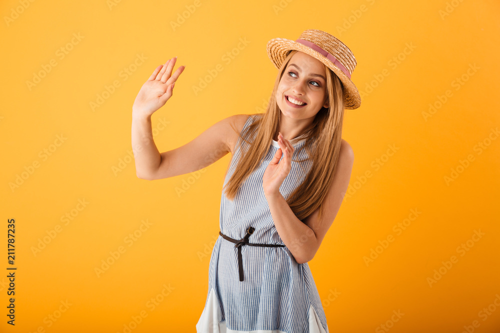 Portrait of a smiling young blonde woman in summer hat Portrait of a smiling young blonde woman in summer hat