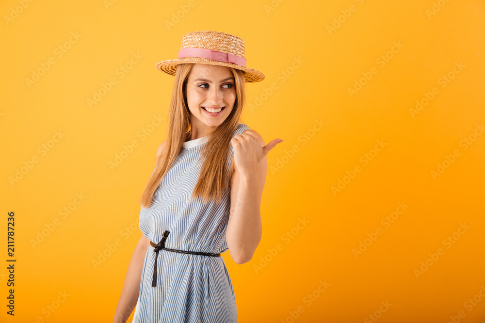 Portrait of a smiling young blonde woman in summer hat Portrait of a smiling young blonde woman in summer hat