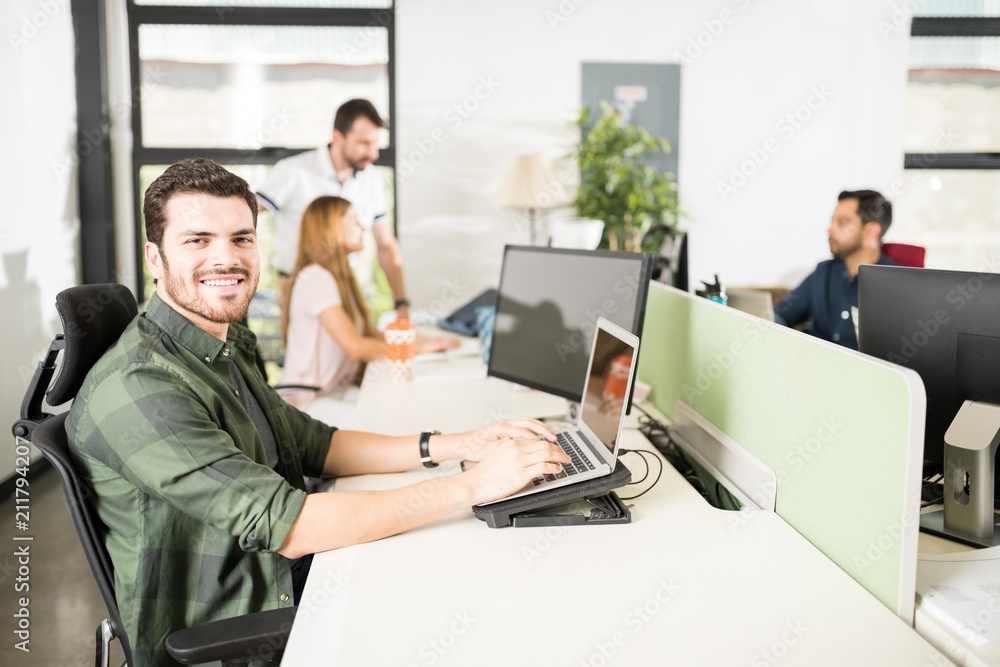 Businessman working at his desk Businessman working at his desk