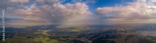 Panoramic view from drone of the fields near mountains