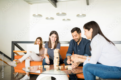 Young employee having break in start up office