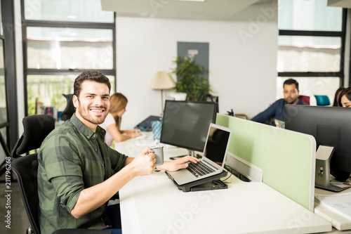 Man having coffee break at work