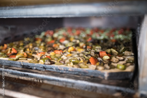 generic photos of Italian pizza preparation