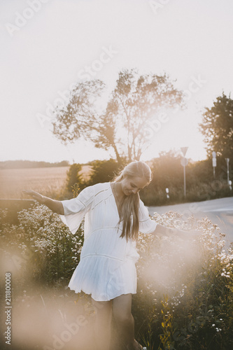 Happy girl in the fields photo