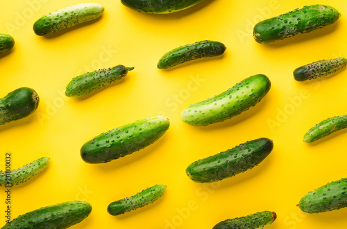 Cucumbers on a yellow background
