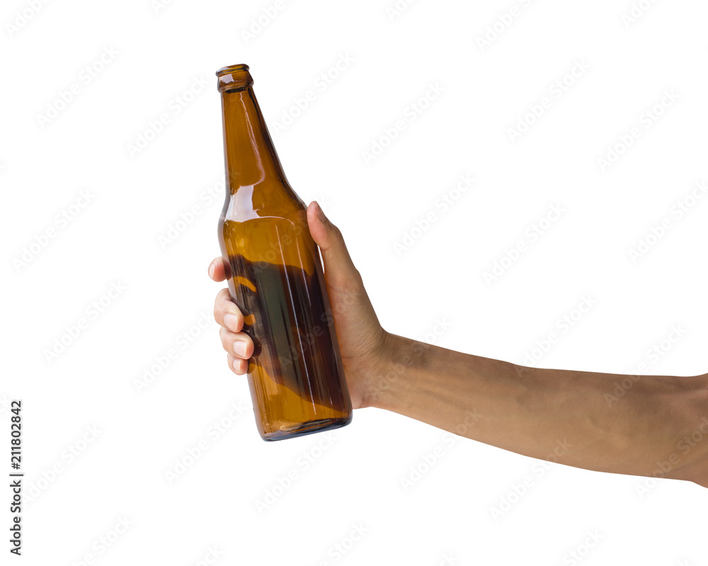 Hand holding beer bottle isolated on white background. Clipping path of  transparent brown bottle without label. Stock Photo | Adobe Stock