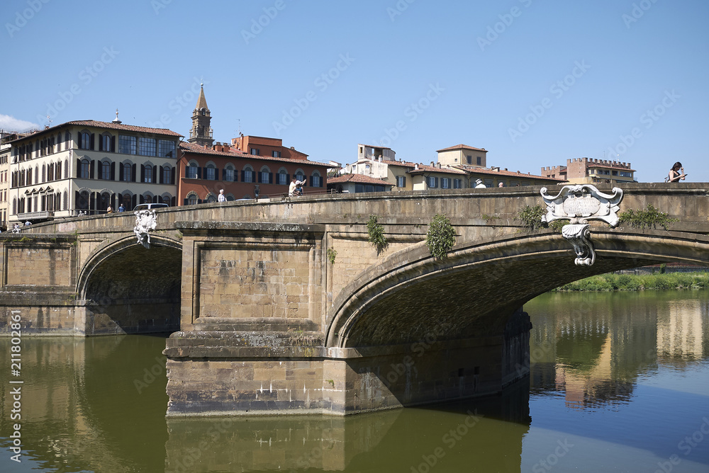Fototapeta premium Firenze, Italy - June 21, 2018 : View of Ponte Santa Trinita (Holy Trinity bridge), the oldest elliptic arch bridge in the world.