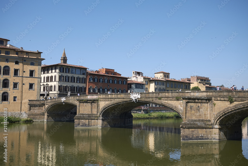 Firenze, Italy - June 21, 2018 : View of Ponte Santa Trinita (Holy Trinity bridge), the oldest elliptic arch bridge in the world.