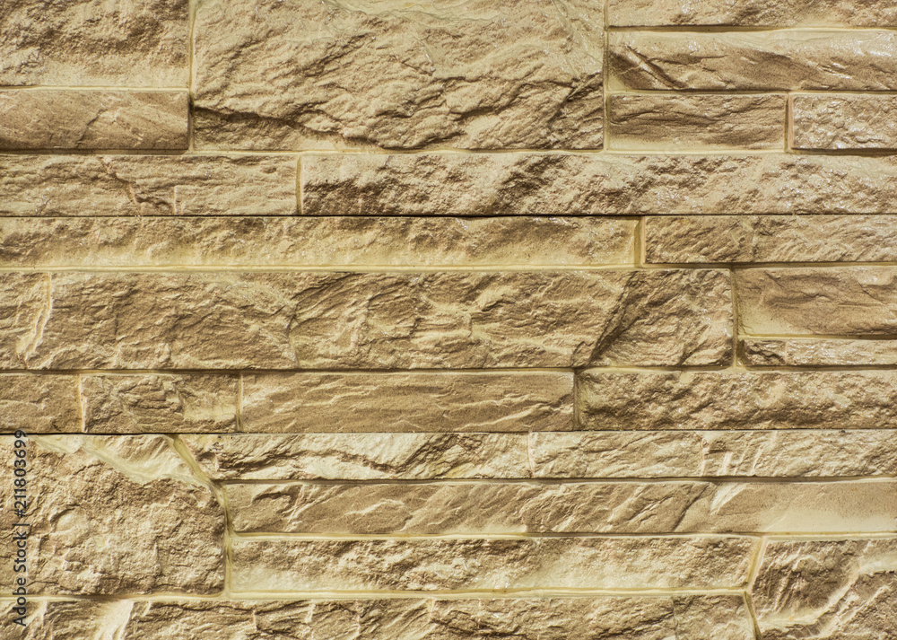 texture and structure of stone, tile, brown wall of blocks of decorative stone texture and structure of stone, tile, brown wall of blocks of decorative stone