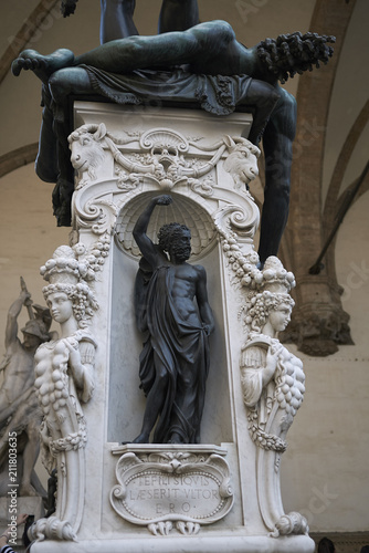 Firenze, Italy - June 21, 2018 : Statue in Loggia dei Lanzi (The base of the sculpture Perseus with the Head of Medusa) photo