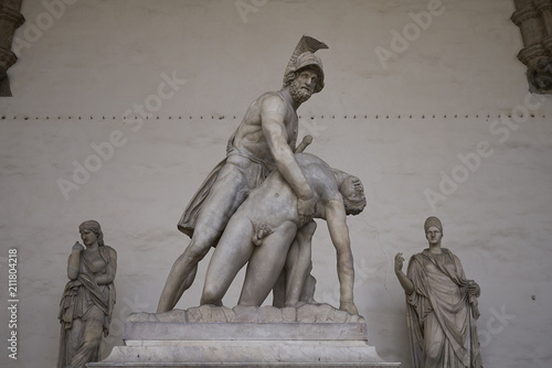 Firenze, Italy - June 21, 2018 : Statue in Loggia dei Lanzi (The Pasquino Group) photo