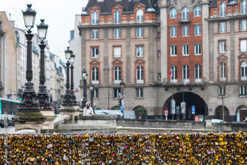 Love padlocks at Pont de l'Archeveche in Paris. The thousands of locks of loving couples symbolize love forever.