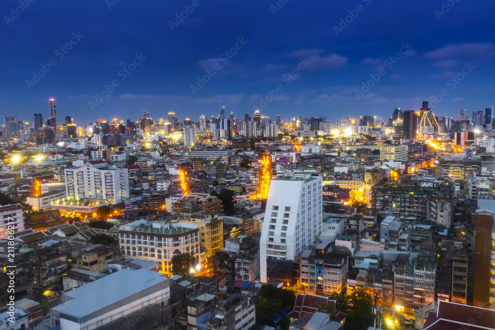 cityscape Bangkok skyline in Twilight night view, Thailand. Bangkok is metropolis and favorite of tourists live at between modern building / skyscraper, Community residents