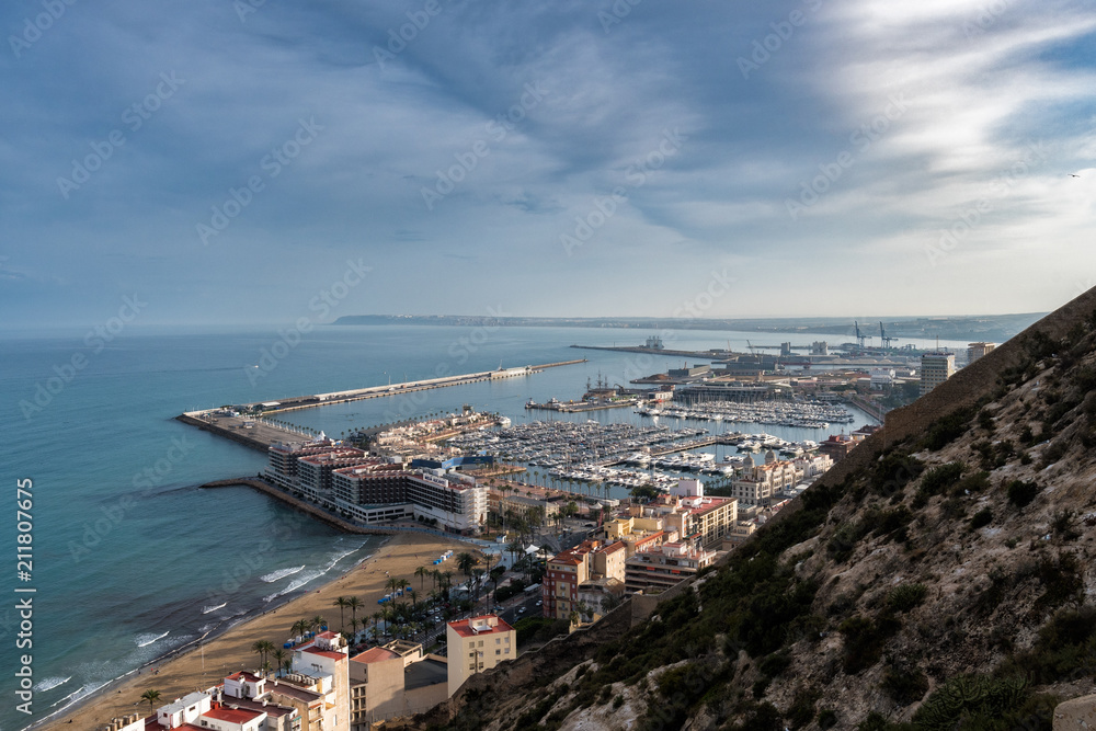 Aerial view of Alicante city from Santa Barbara Castle, showing El Postiguet beach and marina