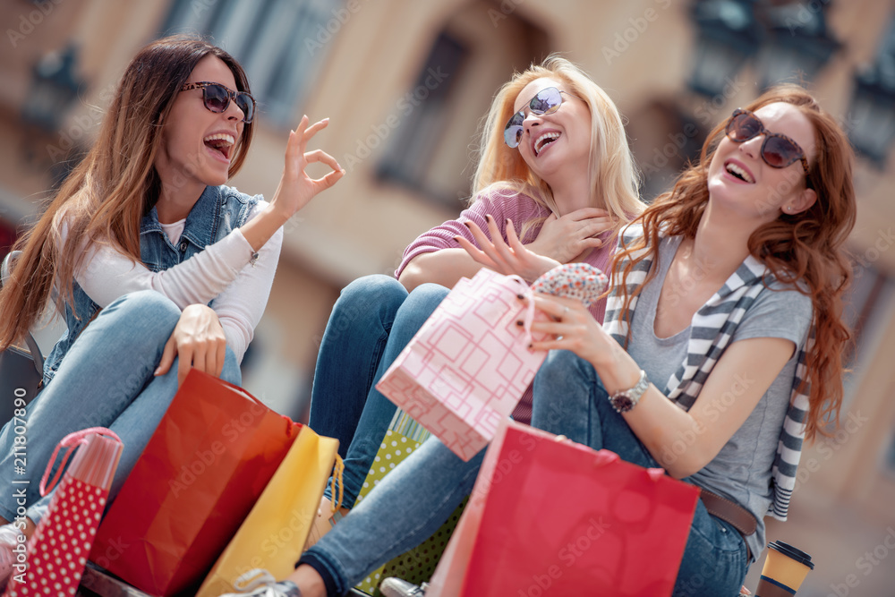Pretty shoppers with shopping bags Pretty shoppers with shopping bags