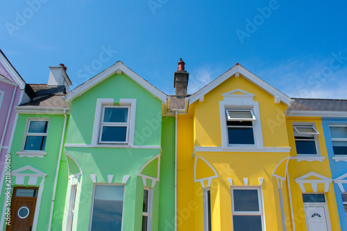 colorful green and yellow houses in whitehead northern ireland photo