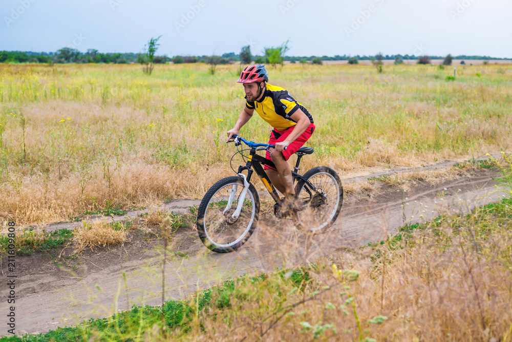 Concept of an active lifestyle, a cyclist riding a bicycle, free space.