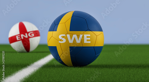 England vs. Sweden Soccer Match - Soccer balls in Sweden and England national colors on a soccer field - 3D Rendering 