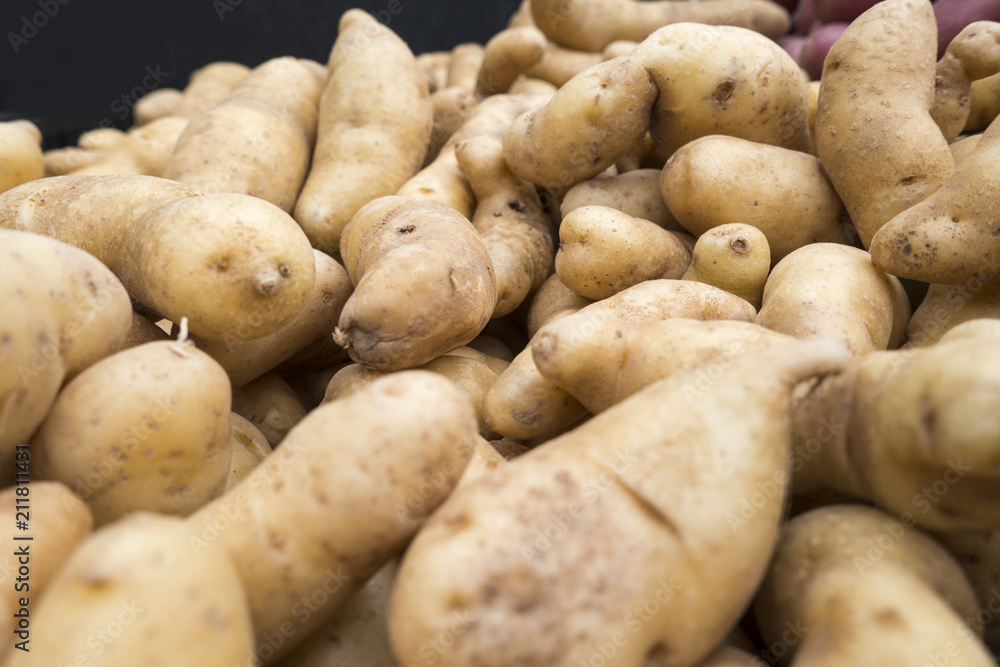 tan brown potatos at the food market tan brown potatos at the food market