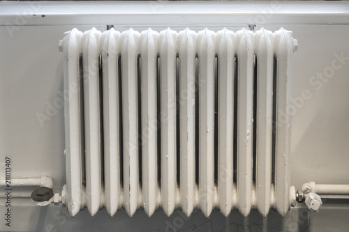 Wallpaper Mural white painted cast iron radiator heater old school classic hot water heating system Torontodigital.ca