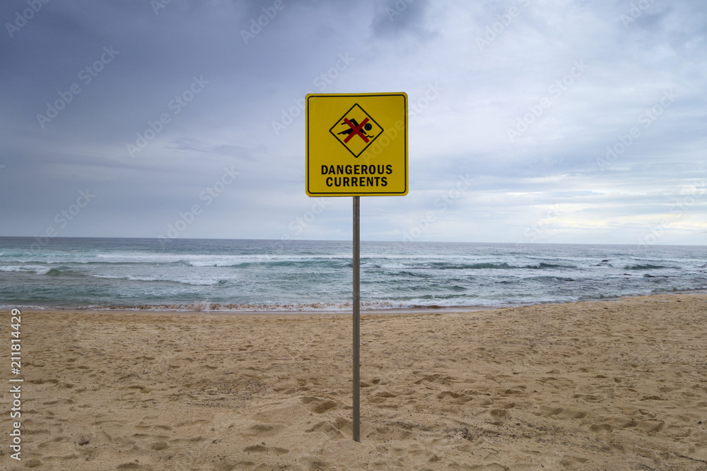 Australian beach front and city bondi beach dangerous currents sign 