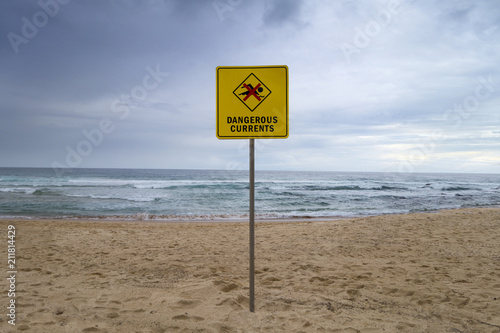 Australian beach front and city bondi beach dangerous currents sign 