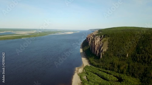 Lena Pillars. Natural rock formation along the banks of the Lena River in far eastern Siberia. The pillars are 150–300 metres high, and were formed in some of the Cambrian period sea-basins. photo