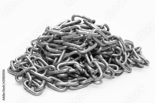 Metal strong chain lying on a white background