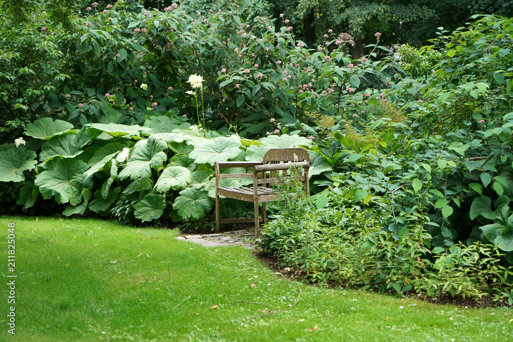 Park bench in a Bavarian park to relax and rest

