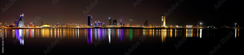 Fototapeta premium Bahrain skyline during night, a panoramic view