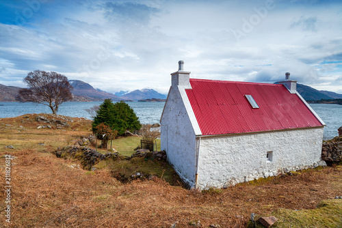 A small croft on Loch Shieldaig near Applecross in the Highlands of Scotland photo