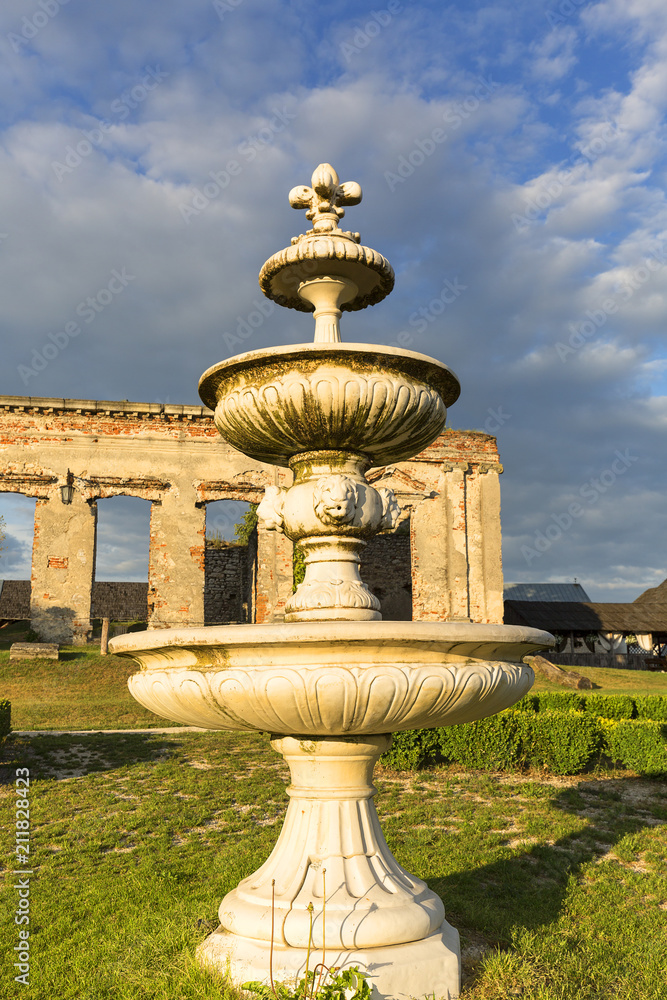 Obraz premium Ruins of 18th century classical palace, manor complex at sunset, situated on the Nida River near Jedrzejow, Sobkow, Poland