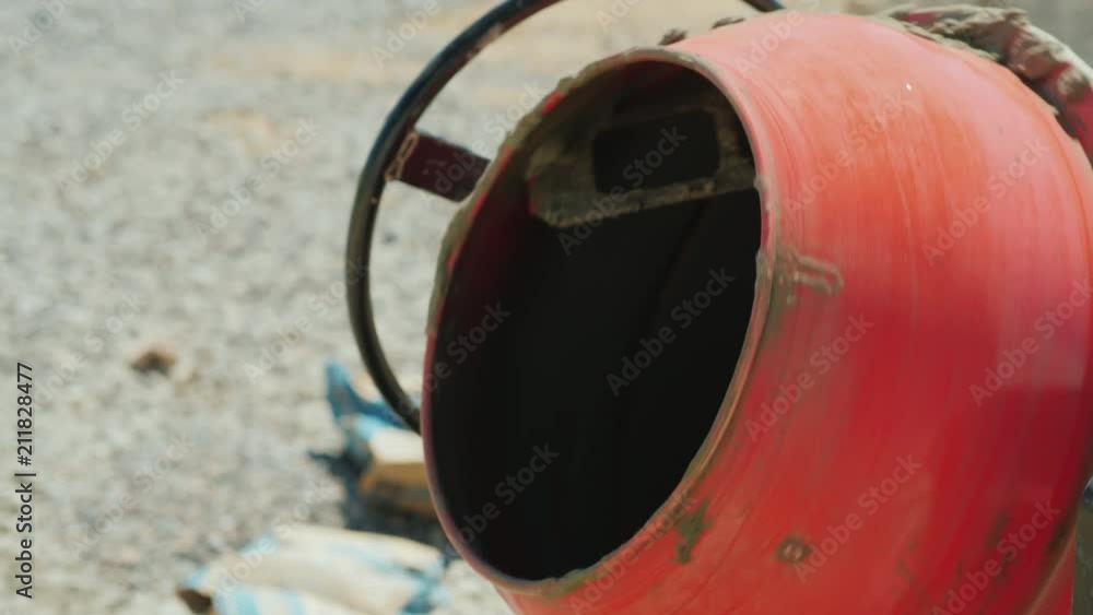 Preparation of mortar in a small concrete mixer Preparation of mortar in a small concrete mixer