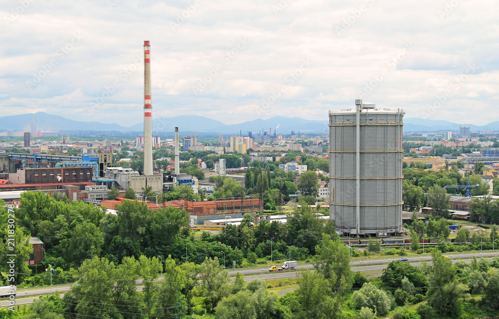 view on the industrial city with factory, smokestack and estate housing in Ostrava, Czech Republic